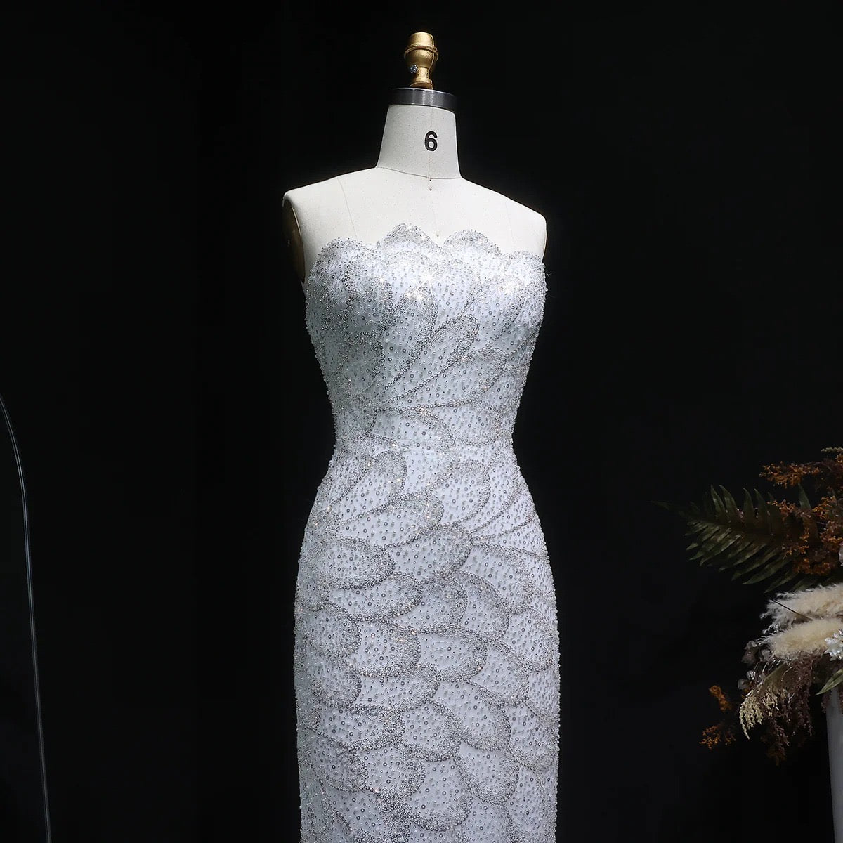 Écailles d’émeraude en blanc