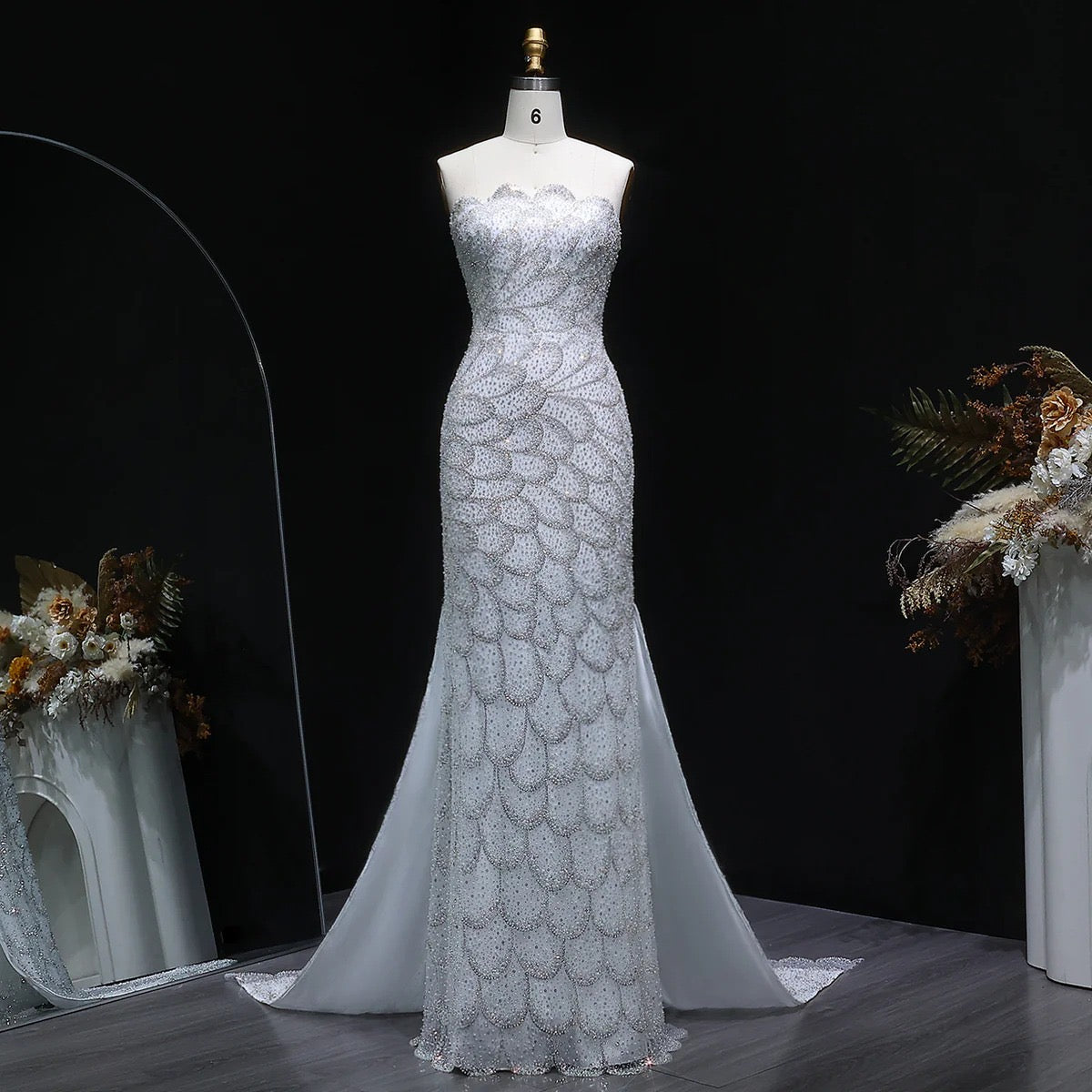 Écailles d’émeraude en blanc