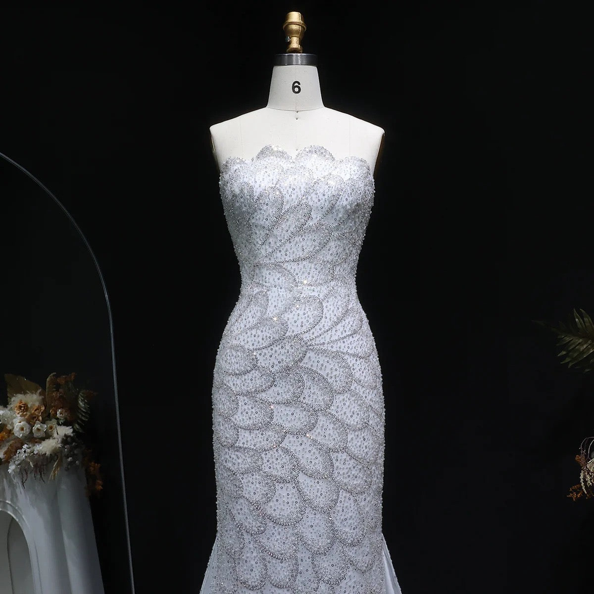 Écailles d’émeraude en blanc